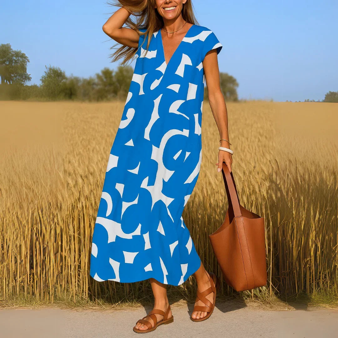 Rebeca | Vestido estampado con escote en V y detalles calados