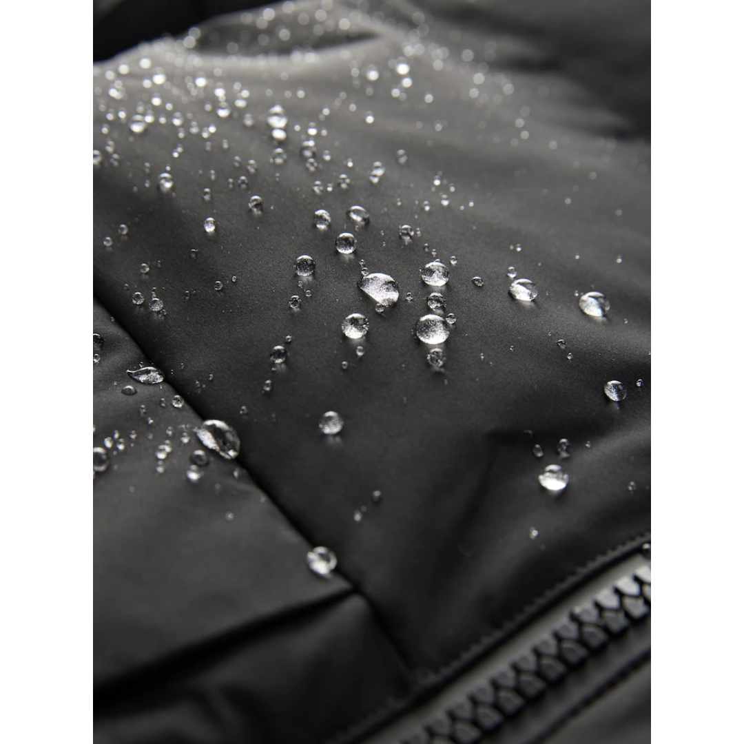 Amparo | Abrigo impermeable acolchado con capucha