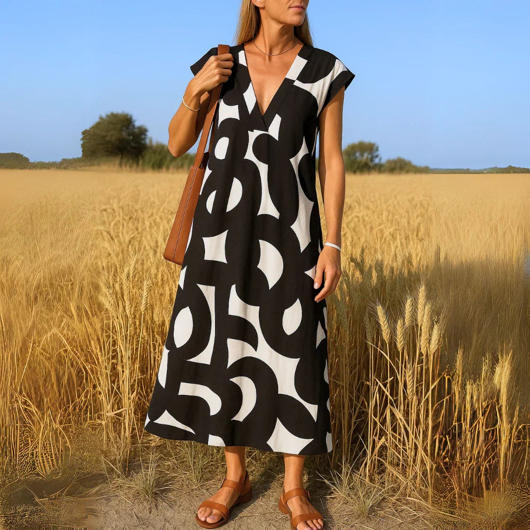 Rebeca | Vestido estampado con escote en V y detalles calados