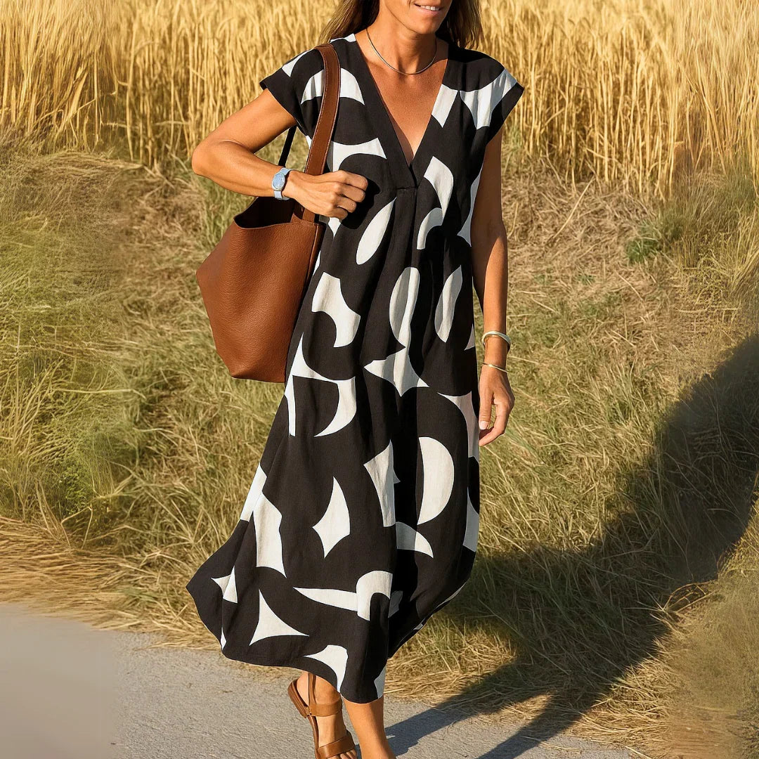 Rebeca | Vestido estampado con escote en V y detalles calados