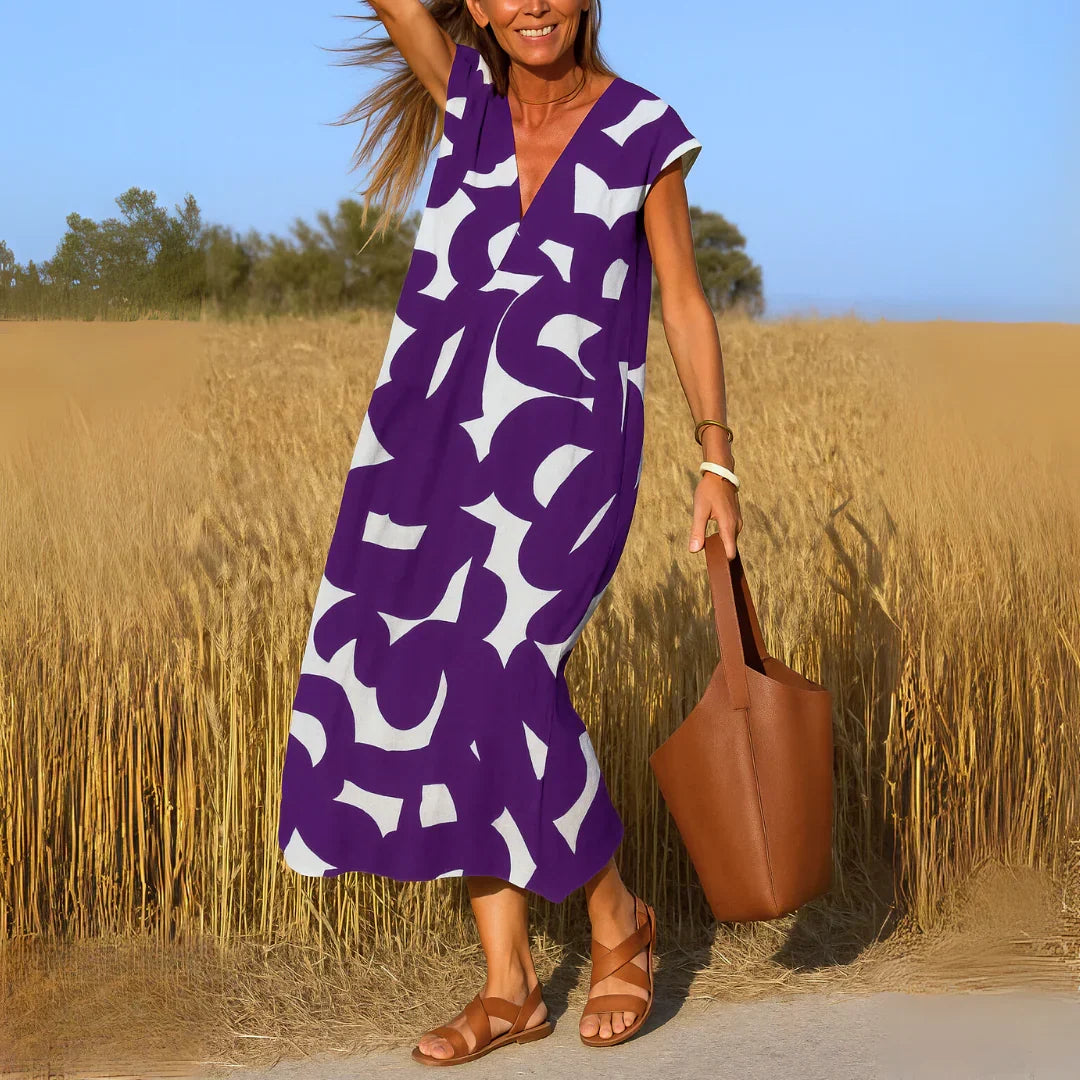 Rebeca | Vestido estampado con escote en V y detalles calados