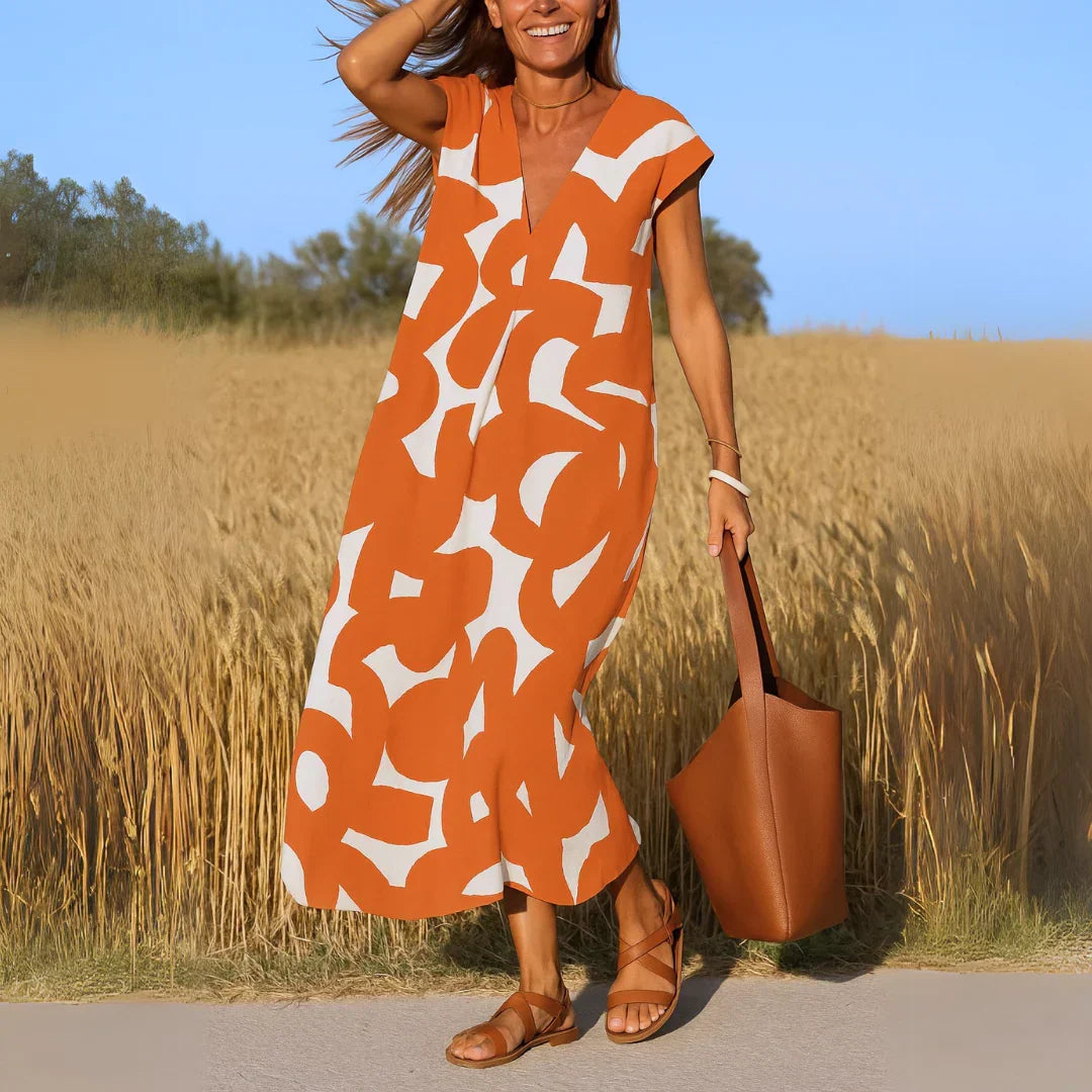 Rebeca | Vestido estampado con escote en V y detalles calados
