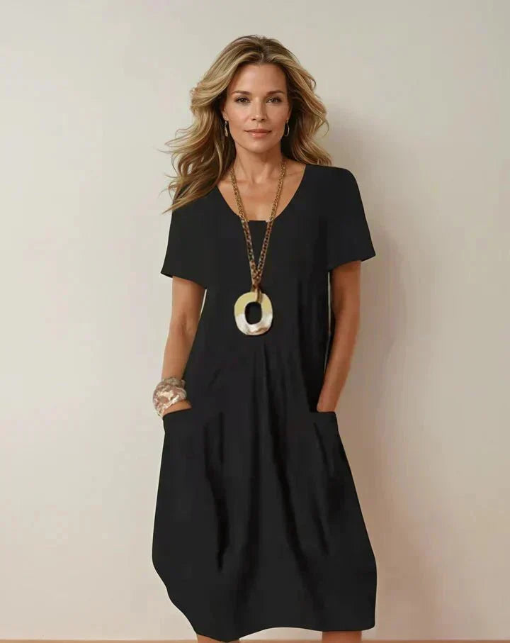 Tamara | Vestido fluido por la rodilla con bolsillos