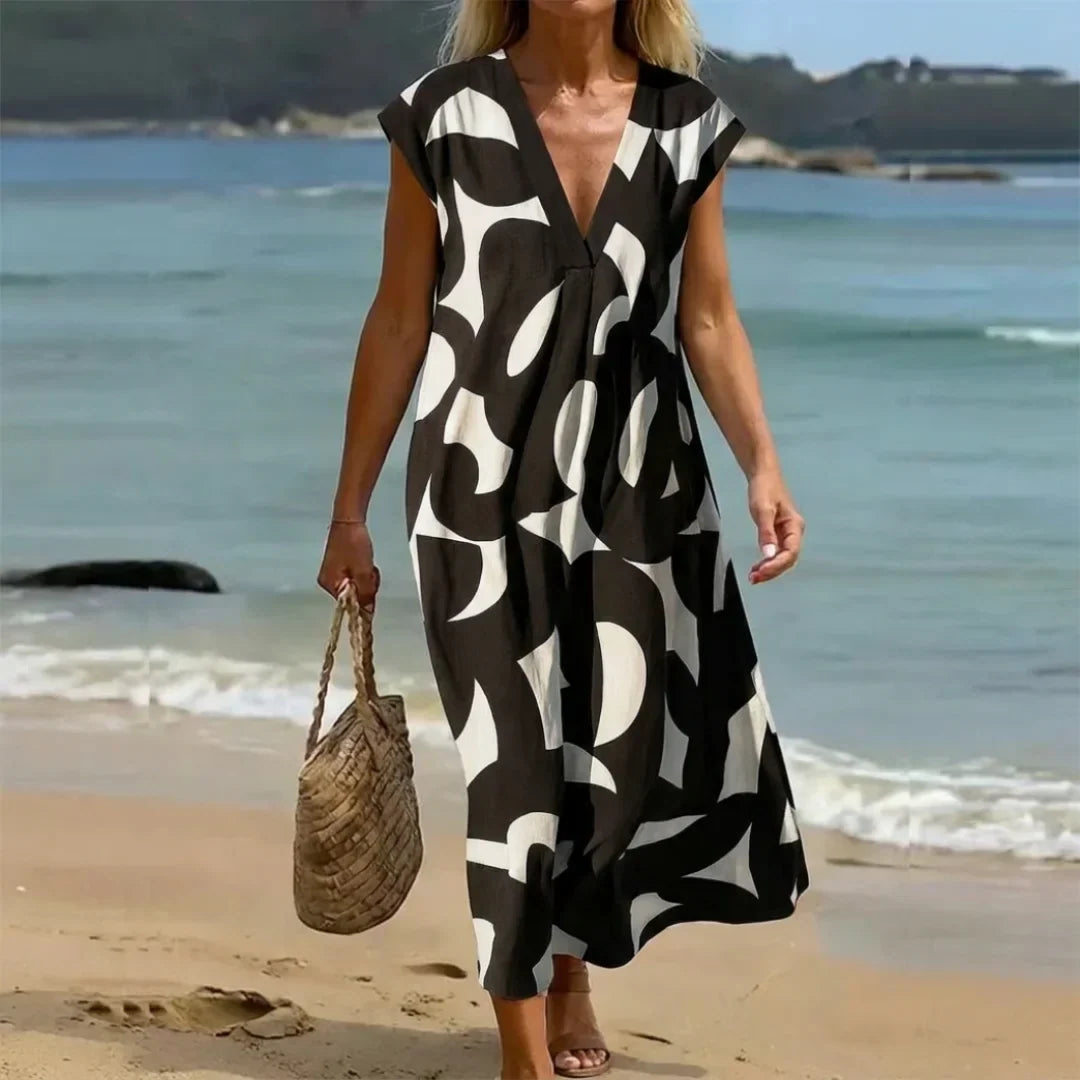 Rebeca | Vestido estampado con escote en V y detalles calados